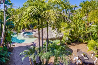 View of yard/pool/patio from the rear-facing balco