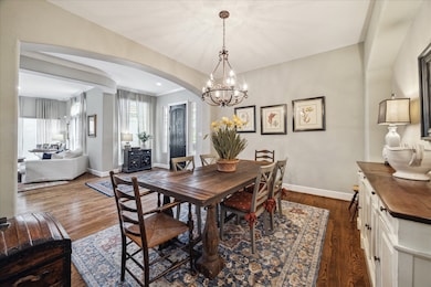 Formal Dining room open to entry, kitchen and over