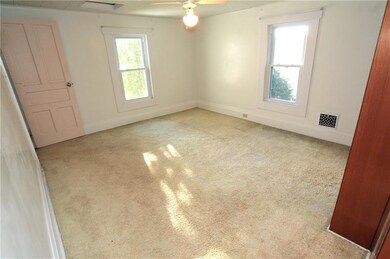 This lovely second bedroom will be a wonderful pla