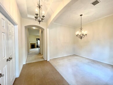 Welcome home! Beautiful formal dining room and study room to your left right as you walk in