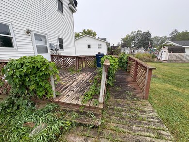 Large back cedar deck with ramp