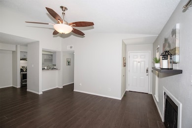 The family room features a lovely fireplace and va