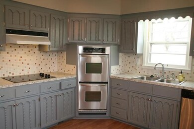 Kitchen features stainless steel appliances includ