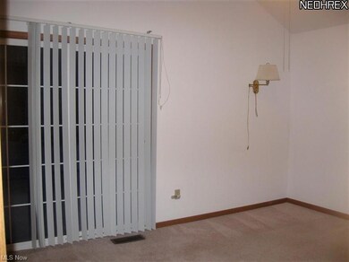 One of the 1st floor bedrooms with sliders to priv