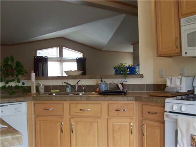Kitchen. kitchem pass-thru to dining and living ro
