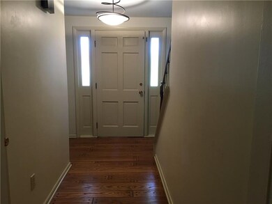 Front entry with newer front door, sidelights, coa
