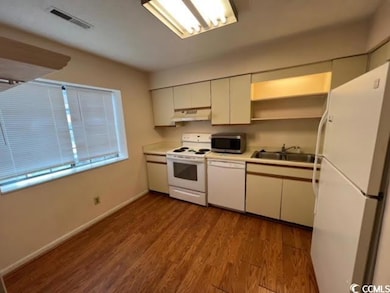 Kitchen featuring light hardwood / wood-style floo
