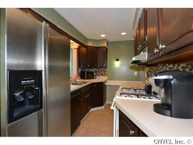 Kitchen. Space saver kitchen has newer flooring, b