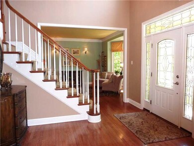 Entry/Foyer. Soaring two stories with circle top w
