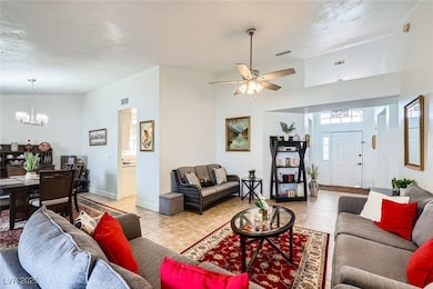 Living area featuring light tile patterned floors,