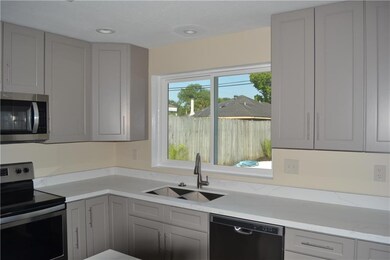 Beautifully remodeled kitchen with quartz countert