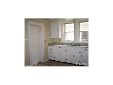 Kitchen door to enclosed porch