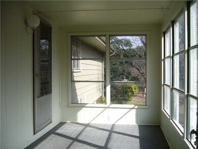Sunroom. Extra entertaining area!  Morning coffee?
