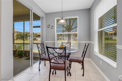Tiled dining area featuring healthy amount of natu