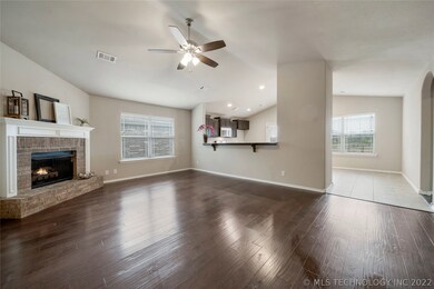 Large open living room with beautiful engineered h