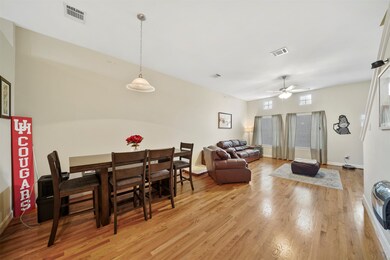 Bright and airy living and dining space featuring