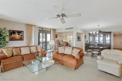Living room with light colored carpet and ceiling