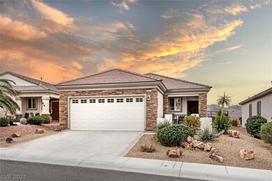 Upgraded front yard, with rock facade front and ga
