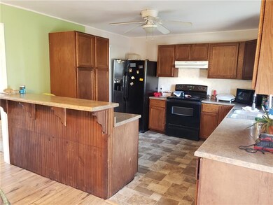 Spacious kitchen with ample cabinet space, pantry,