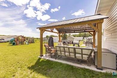 View of yard featuring a gazebo and a patio