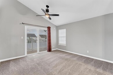 Vaulted Great Room that leads to covered deck