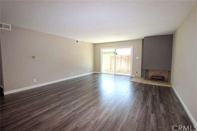 Spacious living room with new flooring