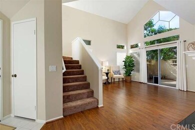 Entry with extra deep lighted coat closet .