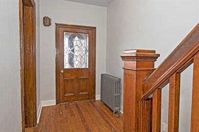 ENTRY Original woodwork, flooring, leaded glass, a