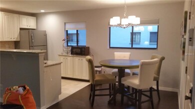 Beautiful floors compliment the eat in kitchen