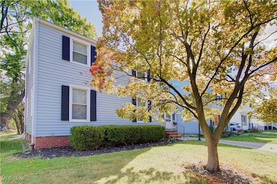 View of front of property with a front yard