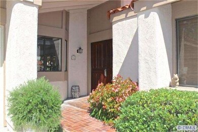Front entryway to this end unit, single level home