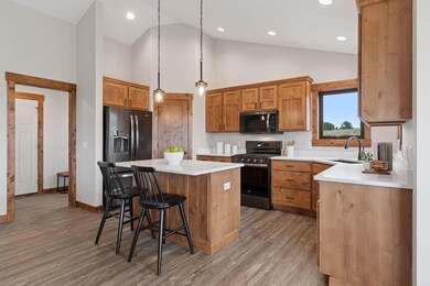 Photos are of a previously completed home with similar design and features. Actual selections, finishes, and materials may vary based on buyer choices and availability.