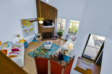 Open view of downstairs living room from the kitch