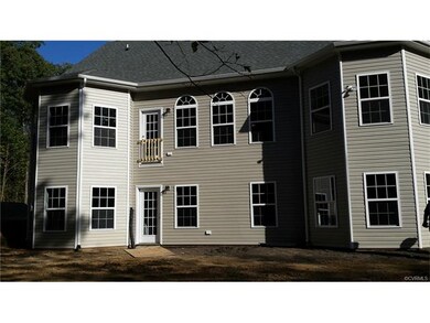 Rear elevation with unfinished basement.