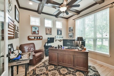 Work won't feel like work in this cozy and warm office. Just look at the ceiling detail!
