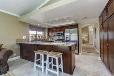 THE STYLISH DIAMOND-LAID TILE FLOORS LEAD FROM THE