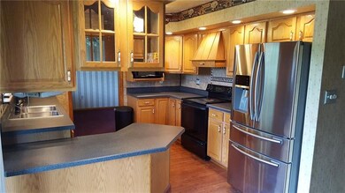 How about a nice warm, glowing kitchen with stainl