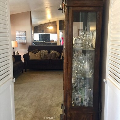 View of the Living Room from the Kitchen and Dining area