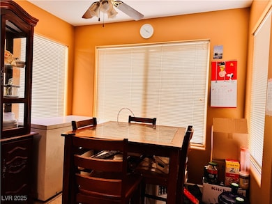 Dining room with a ceiling fan