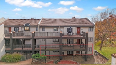 One flight down from parking so easy to bring in groceries and luggage.  Front patio is very private too!