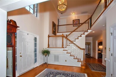 Foyer View Of Offset Stairway To Second Floor.
