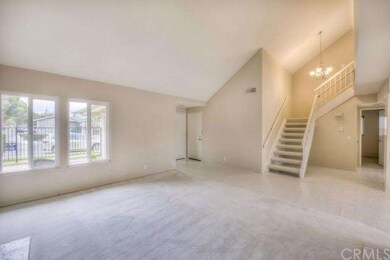 Large windows in the living room bring in ton of n