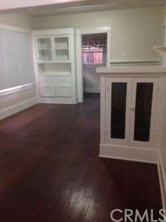 Living room to dining room with original built-in 