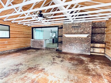 Rustic style great room with Levolor blinds, great space for movie room or flex area