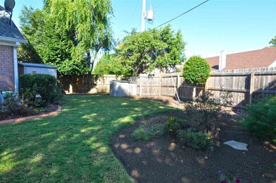 There are 2 storage buildings in the backyard to s