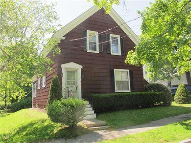 Exterior. Mature plantings and...