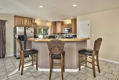 Beautiful kitchen with ample storage between the i