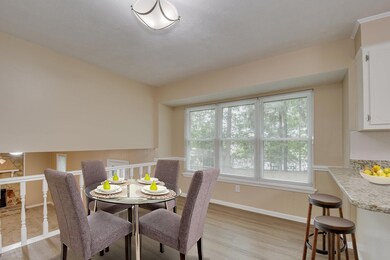 Breakfast table with bar stools on right