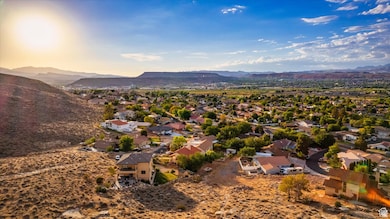 Drone / aerial view with a residential view and a mountain view