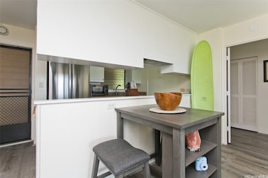 The kitchen features a large farm style sink.